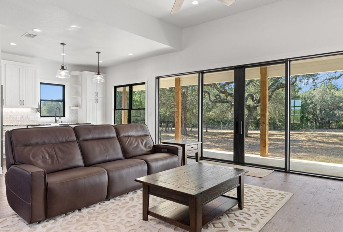 340 Mark Young Road Smithville, TX 78957 - Photo 10 of 40 a living room with furniture and a large window
