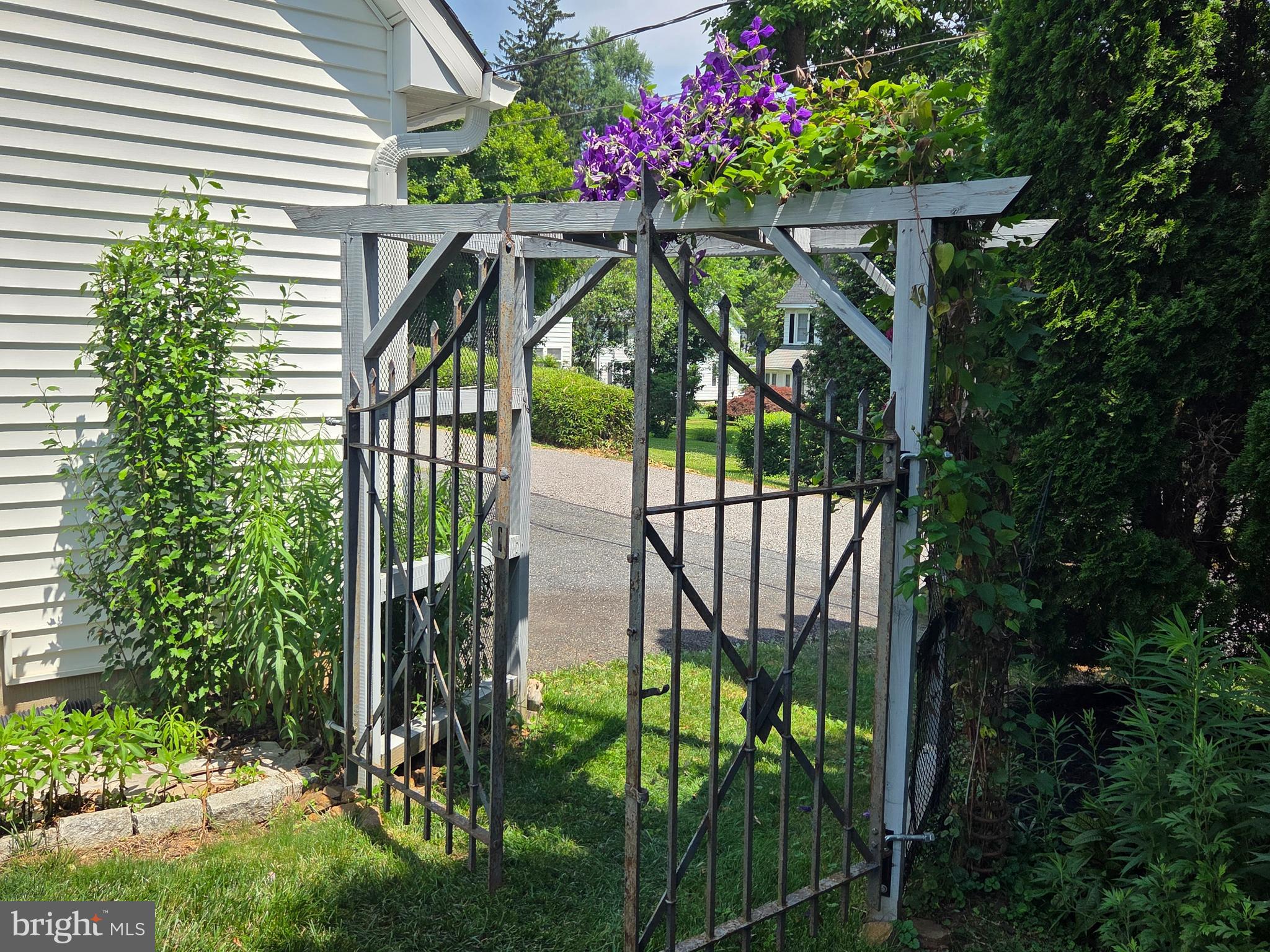 613 Roland Avenue Bel Air, MD 21014 - Photo 26 of 44 Trellis next to garage leading to back alley