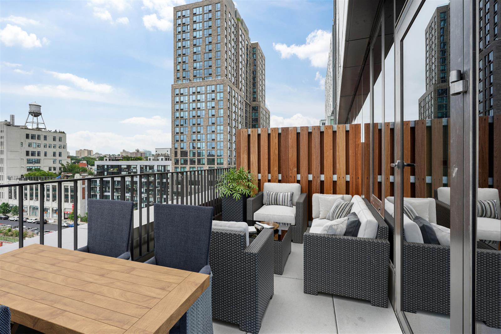 18 6th Avenue, Unit 711 Brooklyn, NY 11217 - Photo 23 of 35 a balcony with furniture