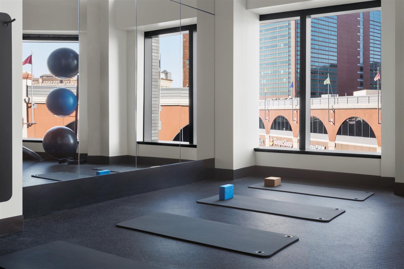 18 6th Avenue, Unit 711 Brooklyn, NY 11217 - Photo 4 of 35 a room with window and gym equipment