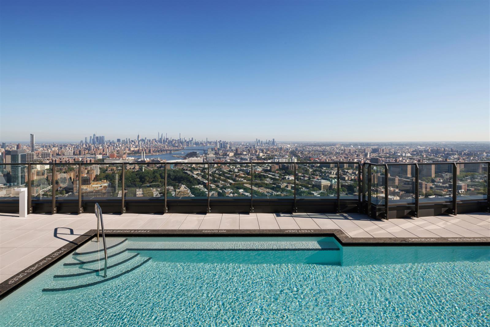 18 6th Avenue, Unit 711 Brooklyn, NY 11217 - Photo 7 of 35 a view of a swimming pool with a terrace