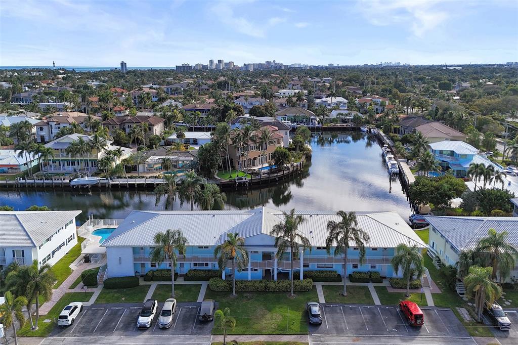2330 Northeast 36th Street, Unit 9 Lighthouse Point, FL 33064 - Photo 1 of 48 an aerial view of a house with a ocean view