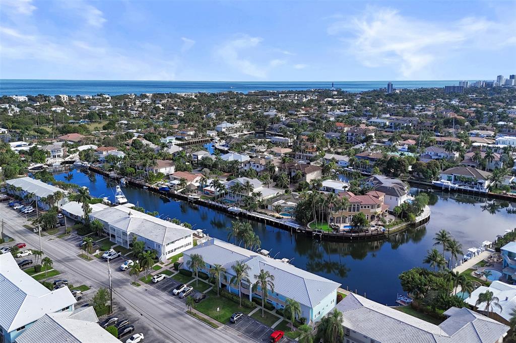2330 Northeast 36th Street, Unit 9 Lighthouse Point, FL 33064 - Photo 39 of 48 an aerial view of a city