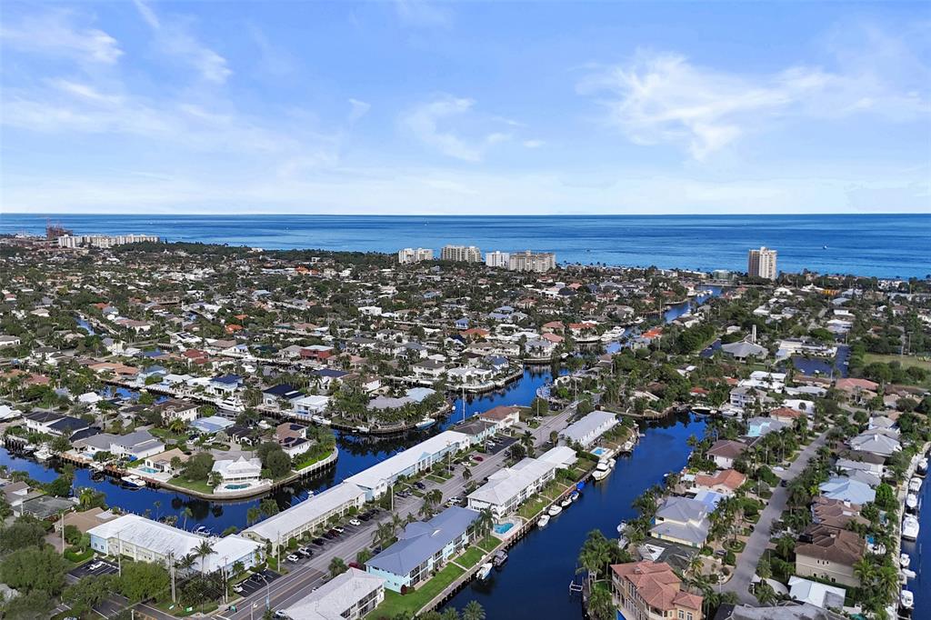 2330 Northeast 36th Street, Unit 9 Lighthouse Point, FL 33064 - Photo 42 of 48 an aerial view of city and lake