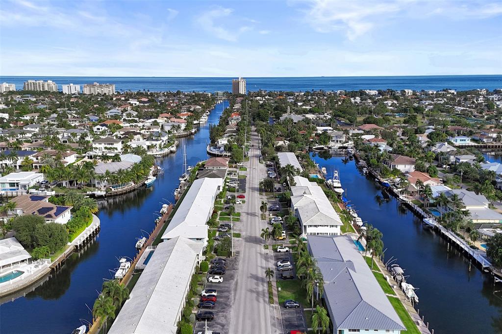 2330 Northeast 36th Street, Unit 9 Lighthouse Point, FL 33064 - Photo 43 of 48 an aerial view of residential building and ocean