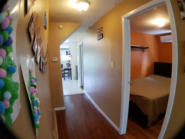 a kitchen with a sink appliances and cabinets