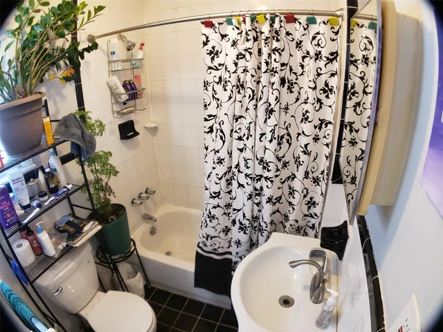 a room with furniture and a mirror