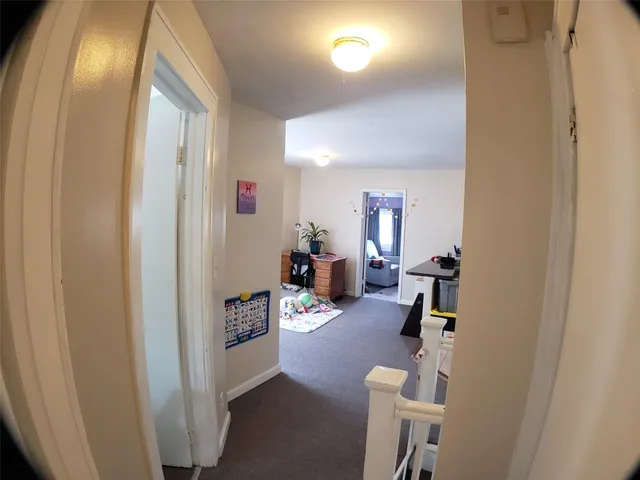 a kitchen with a sink appliances and cabinets