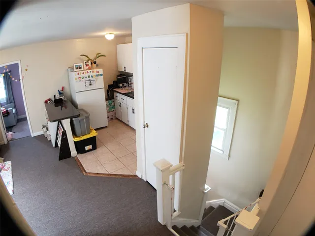 a living room with furniture and window