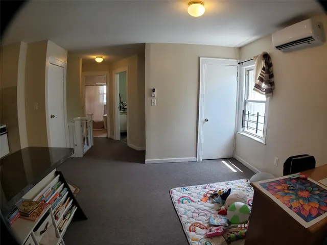 a bedroom with furniture and a couch