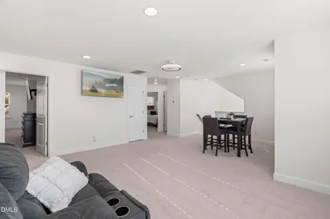 a bedroom with furniture and a table