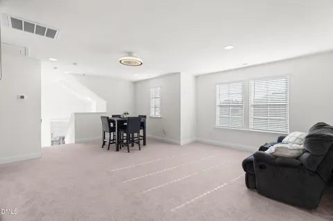 a living room with furniture and window