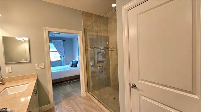 a bathroom with a tub and a sink