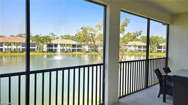 a view of swimming pool from a balcony