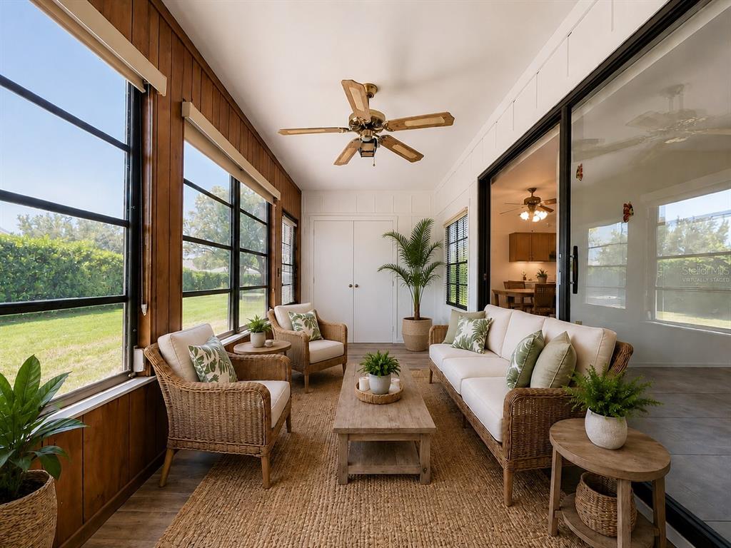 9319 Trowbridge Court New Port Richey, FL 34655 - Photo 37 of 78 a living room with furniture and a large window