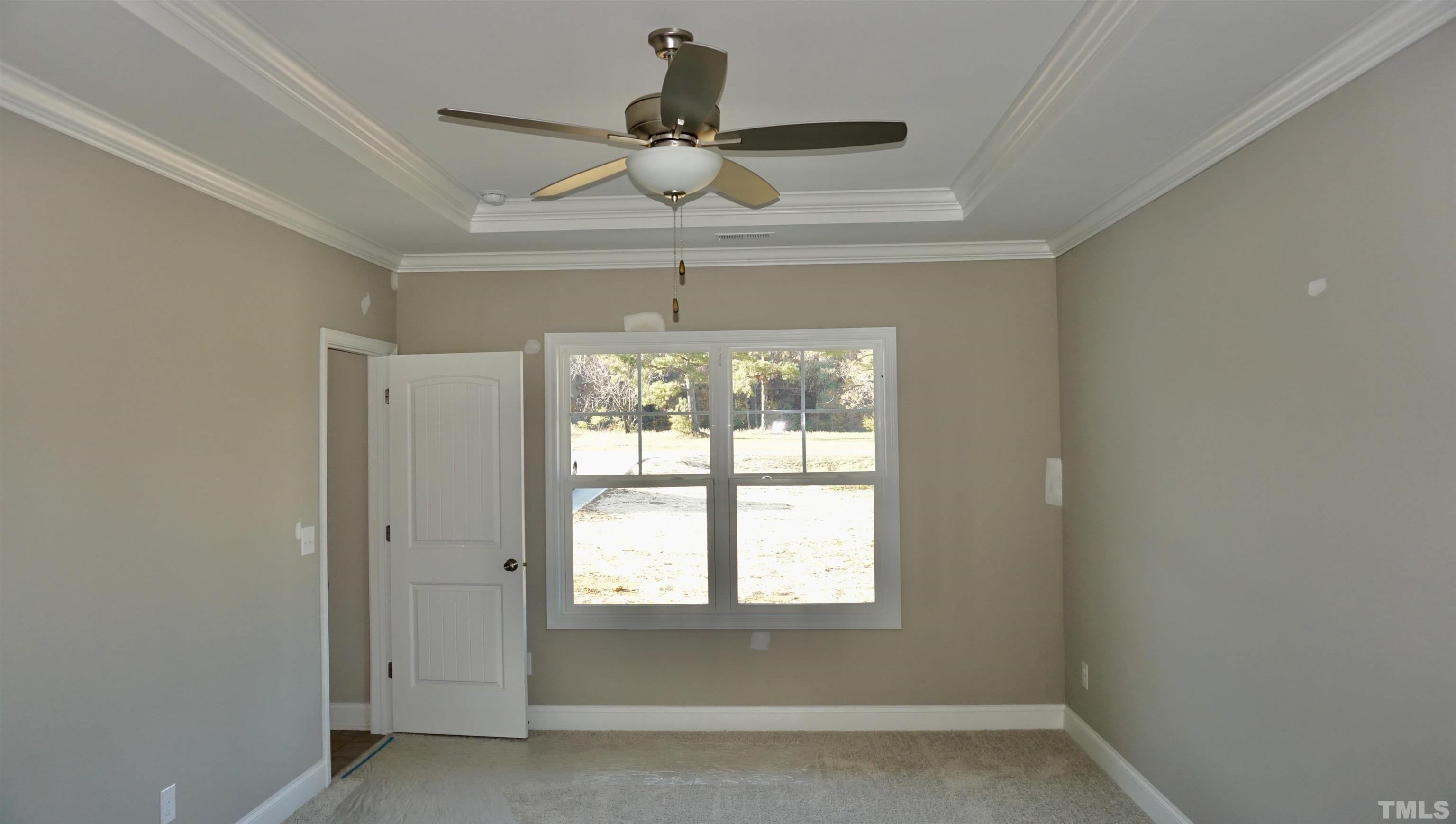 10495 West Old Spring Hope Road Spring Hope, NC 27882 - Photo 22 of 32 a view of an empty room with a window