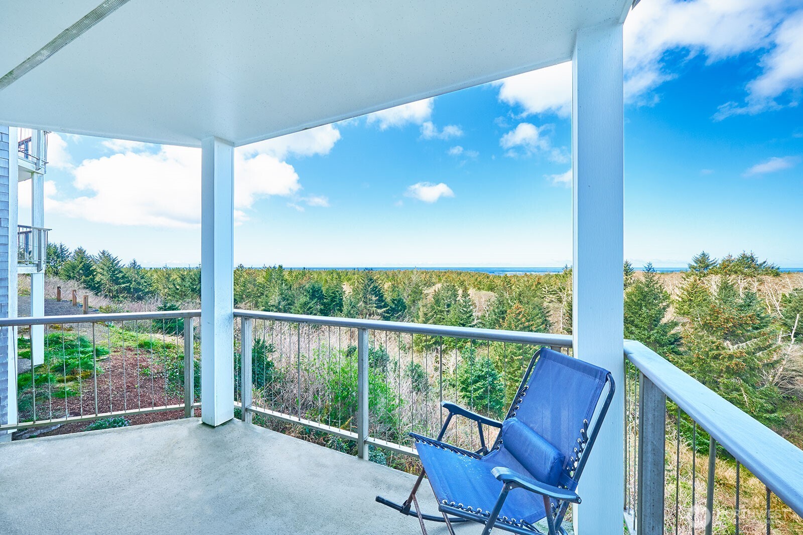 2815 Willows Road, Unit 229 Seaview, WA 98644 - Photo 13 of 25 a view of a two chair in the balcony