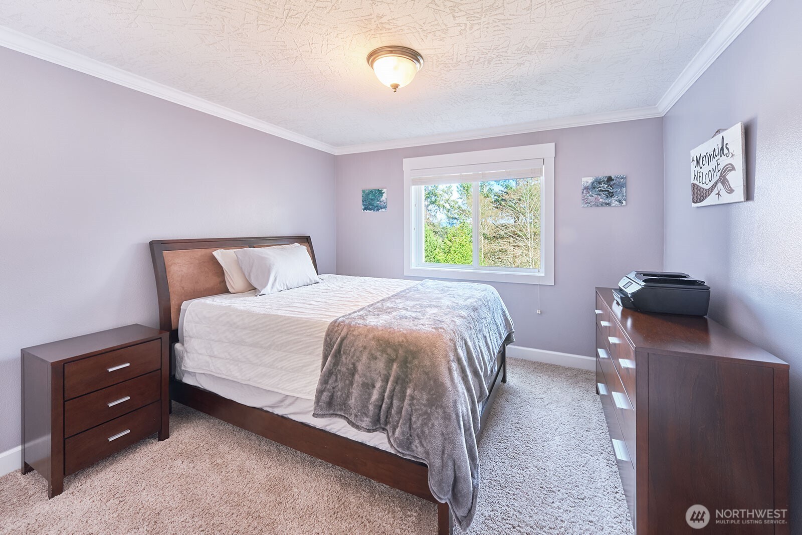 2815 Willows Road, Unit 229 Seaview, WA 98644 - Photo 16 of 25 a bedroom with a bed and a window