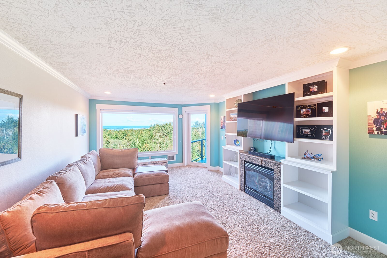 2815 Willows Road, Unit 229 Seaview, WA 98644 - Photo 6 of 25 a living room with furniture a large window with kitchen view