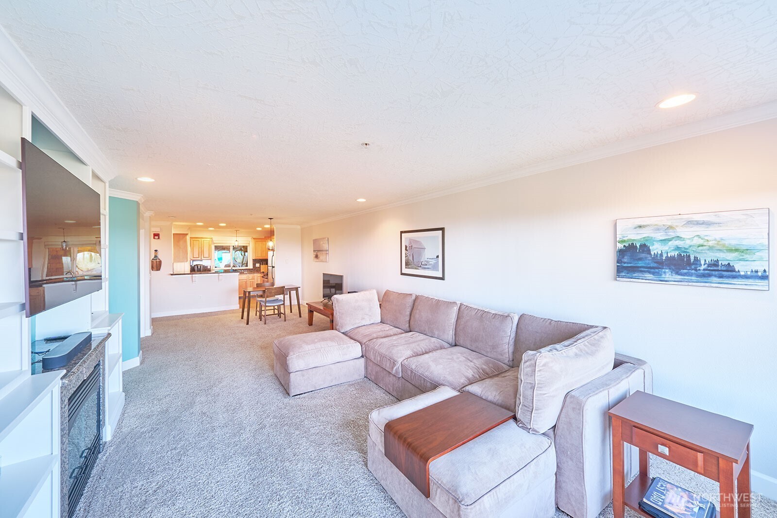2815 Willows Road, Unit 229 Seaview, WA 98644 - Photo 9 of 25 a living room with furniture and a large window