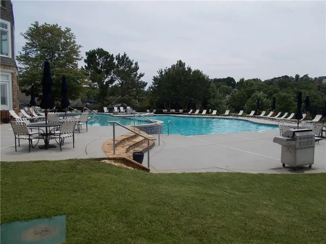 a front view of building with yard