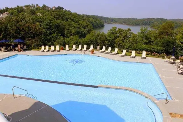 a view of a chairs and table on the terrace