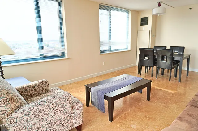 a room with furniture and window