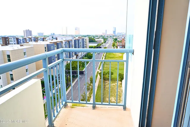 a view of balcony with furniture