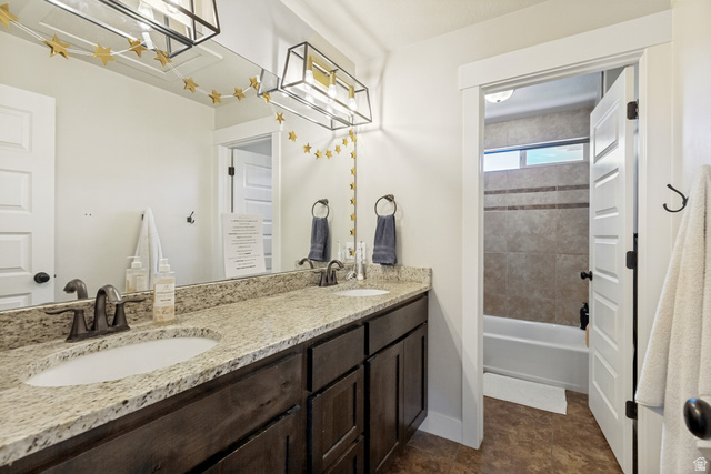 40 Wheeler Road Heber City, UT 84032 - Photo 16 of 41 Dual vanity with light-colored countertop and dark wood-finish cabinetry
