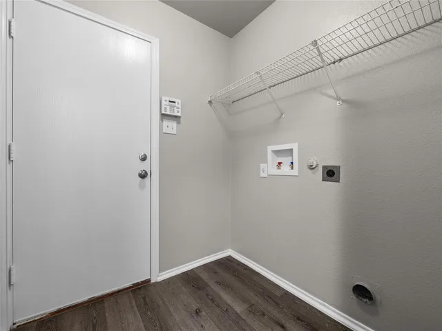 a view of small space with racks on the wall