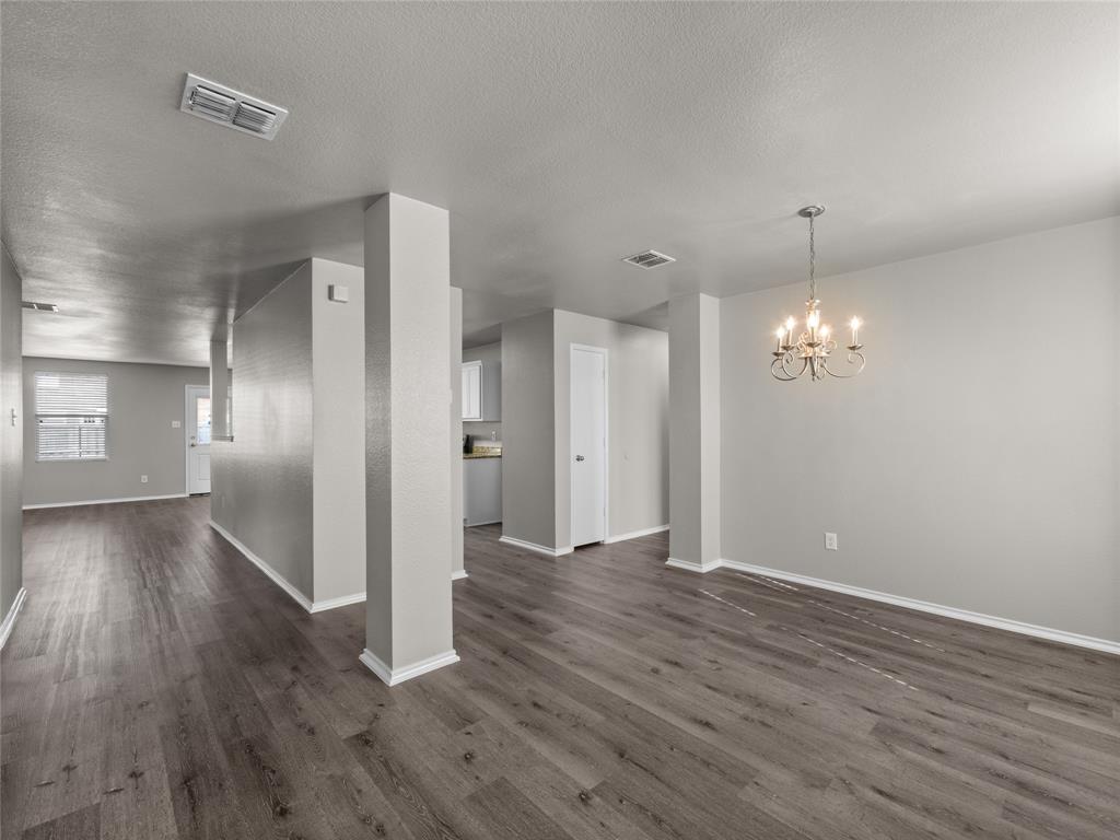 1021 Badger Run Lancaster, TX 75134 - Photo 3 of 25 a view of a hallway with wooden floor