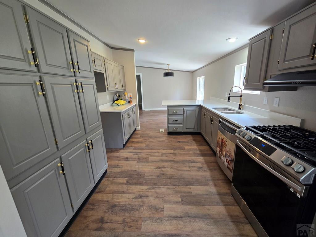 8229 Green Lane Rye, CO 81069 - Photo 5 of 24 a kitchen with sink a stove and refrigerator