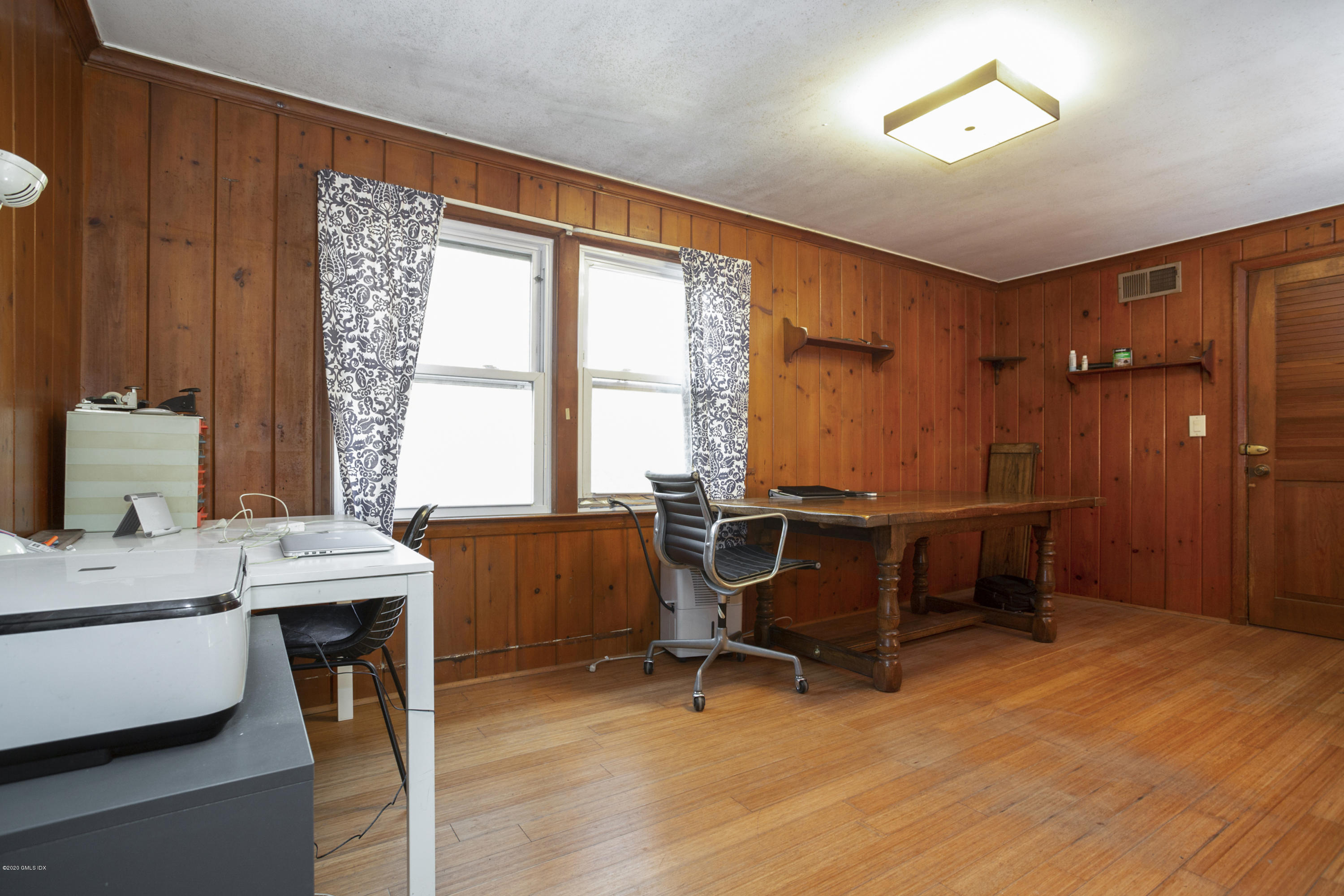 450 Riversville Road Greenwich, CT 06831 - Photo 11 of 14 a workspace with furniture and window
