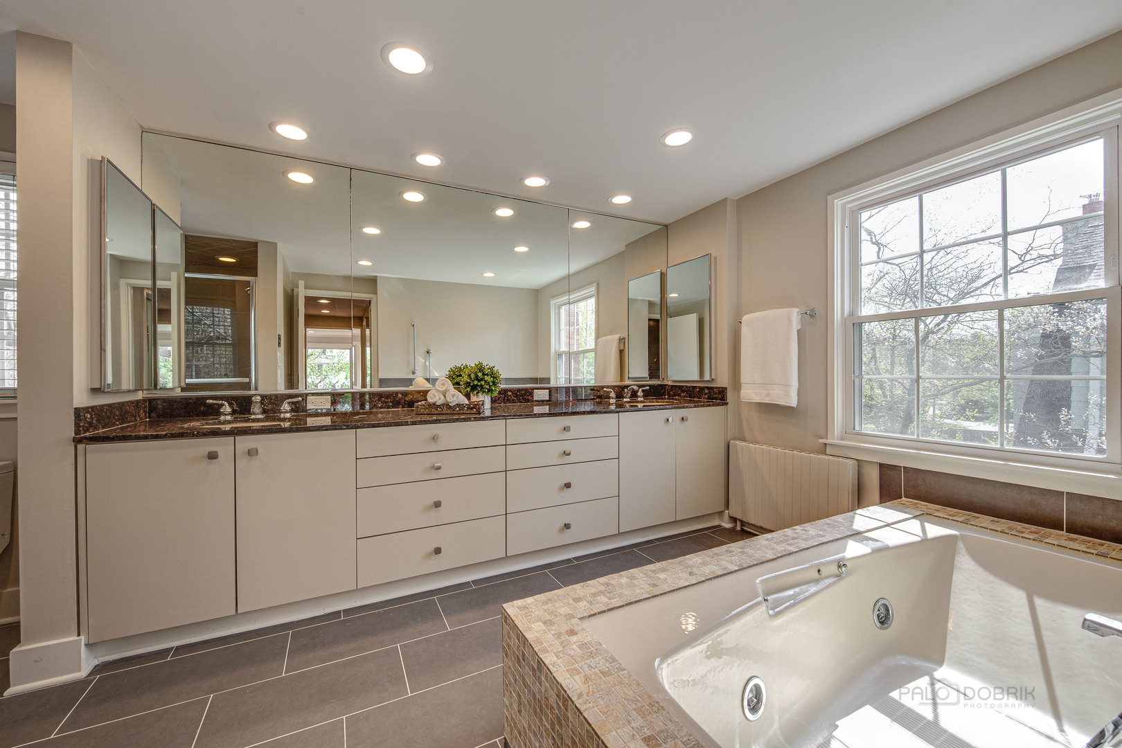 1417 Tower Road Winnetka, IL 60093 - Photo 22 of 39 a large white kitchen with a large window