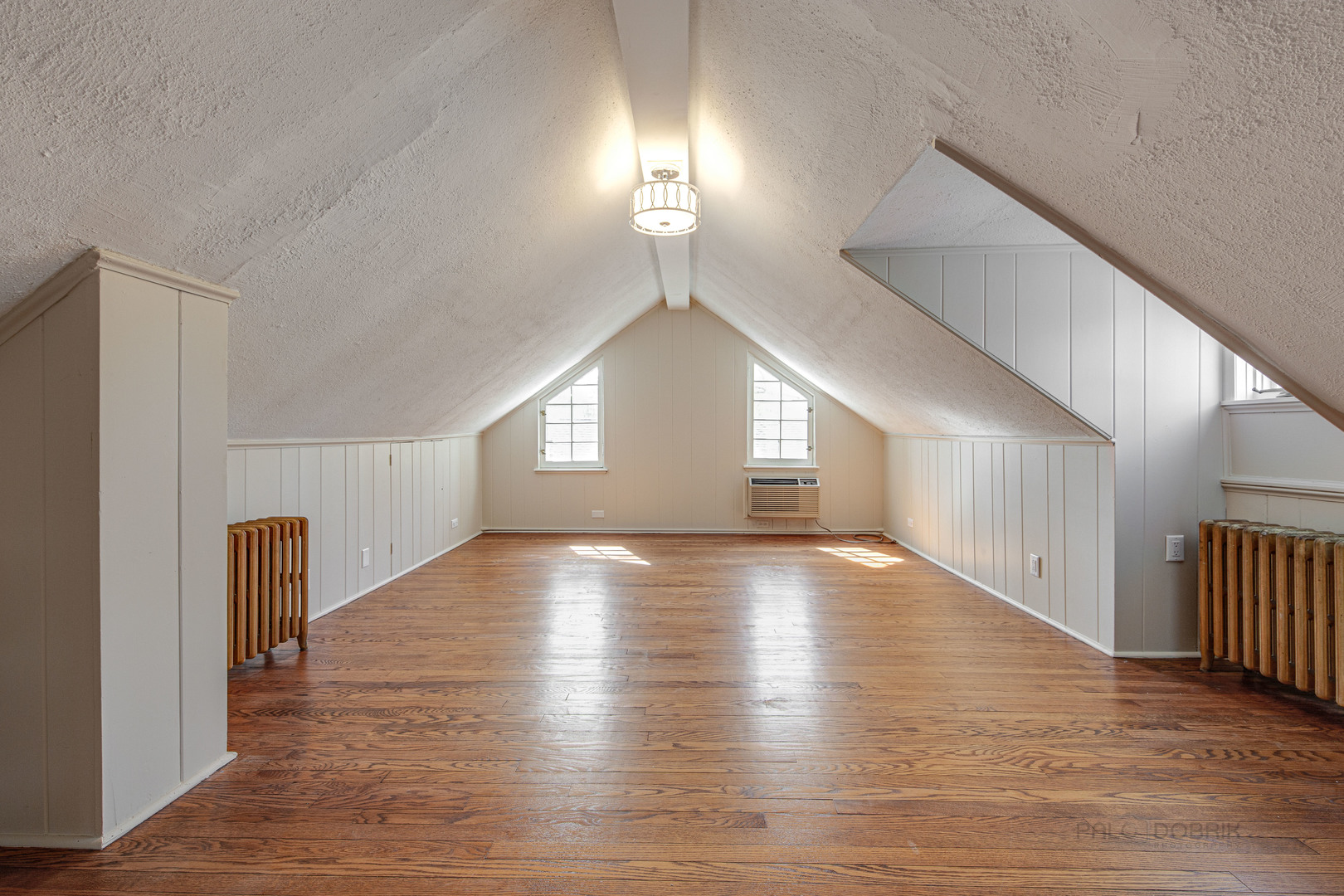 1417 Tower Road Winnetka, IL 60093 - Photo 28 of 39 a view of empty room with wooden floor and fan