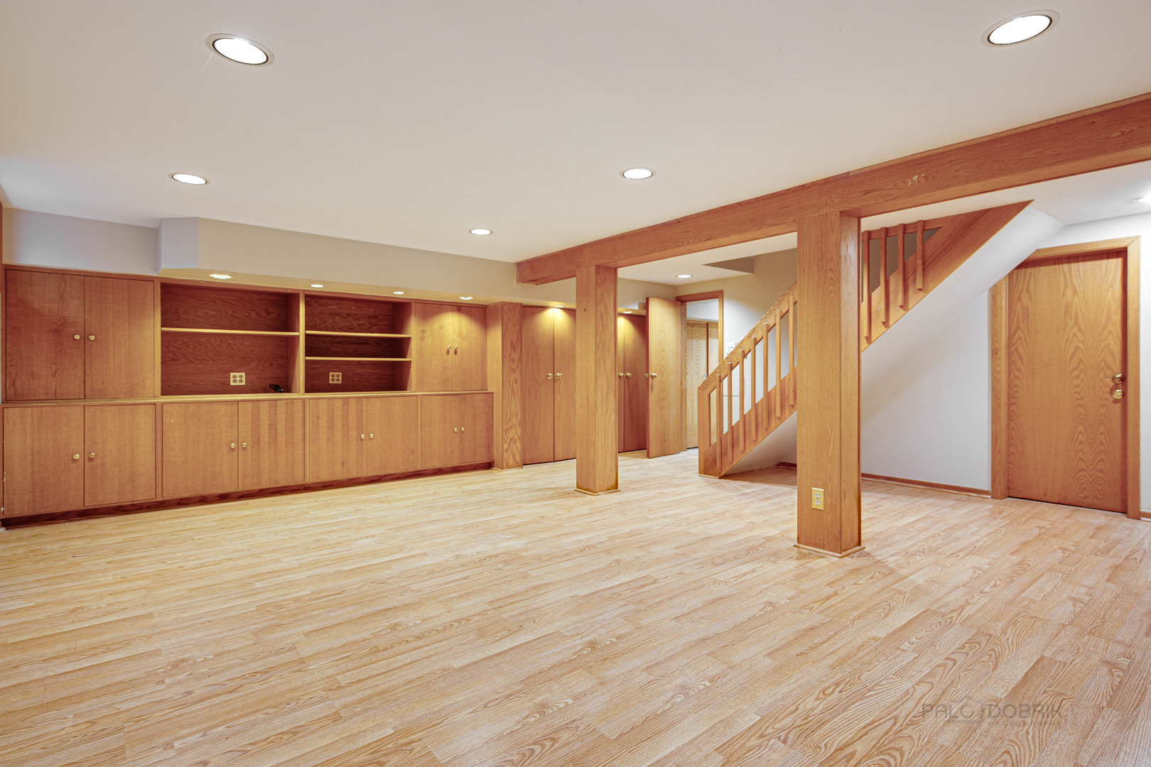 1417 Tower Road Winnetka, IL 60093 - Photo 30 of 39 a view of an empty room with wooden floor and windows