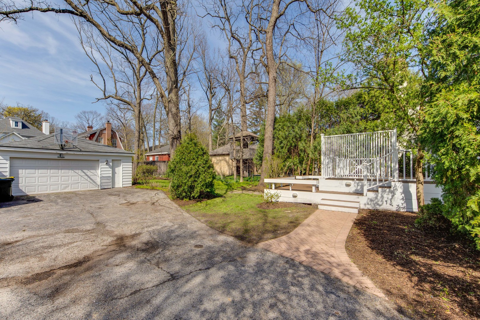 1417 Tower Road Winnetka, IL 60093 - Photo 33 of 39 a view of a yard with plants and large trees