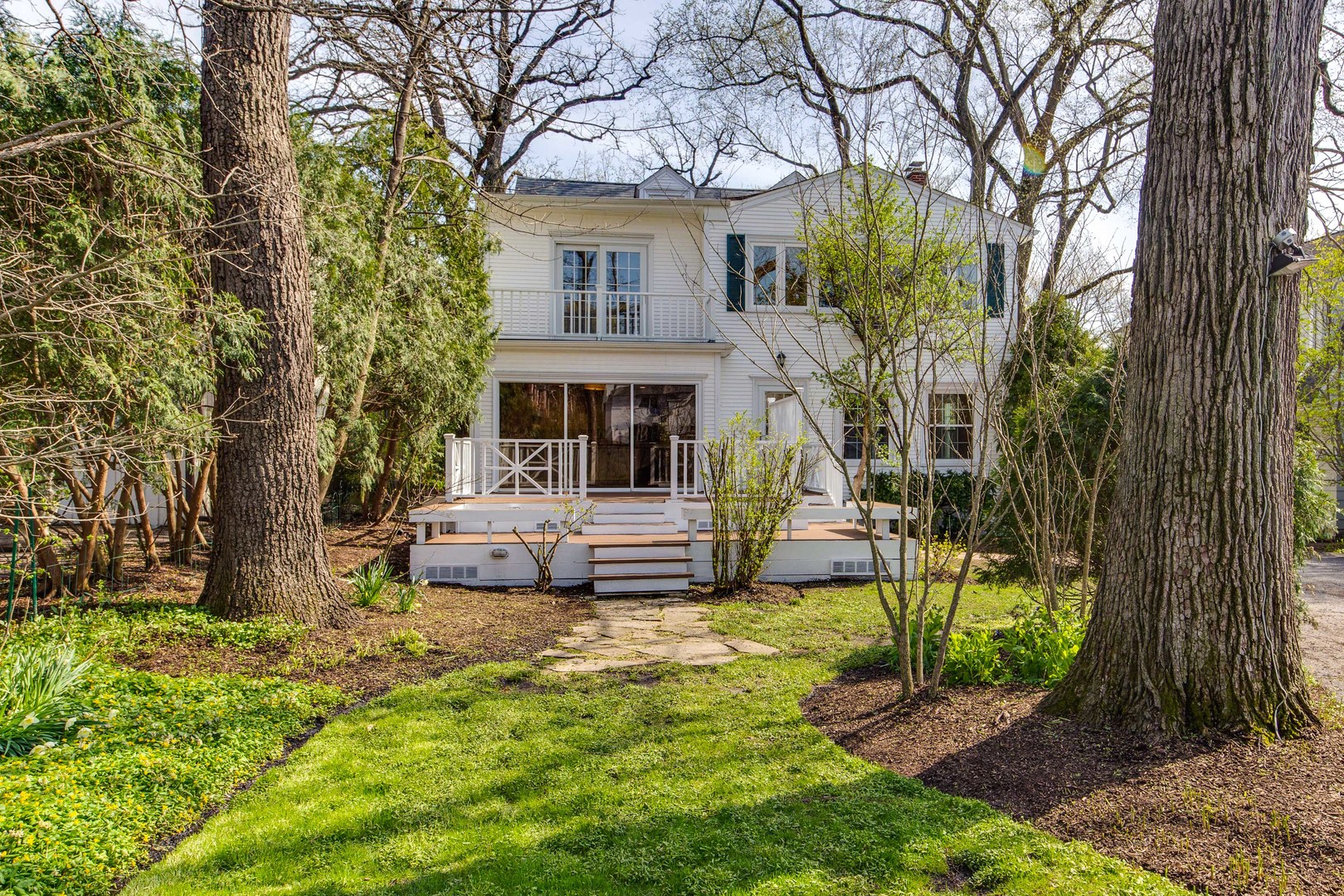 1417 Tower Road Winnetka, IL 60093 - Photo 34 of 39 a view of a house with a yard