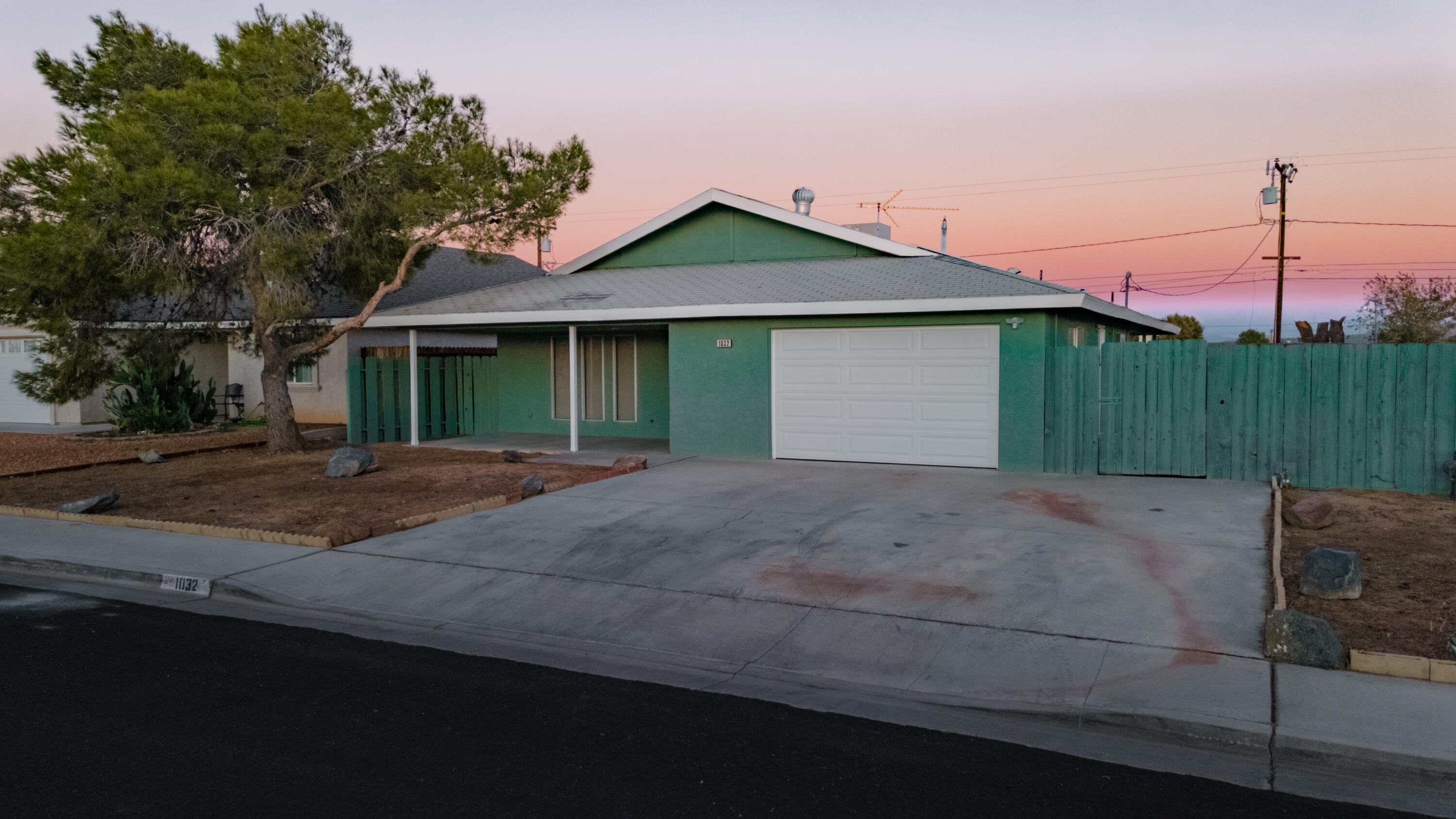 1032 South Farragut Street Ridgecrest, CA 93555 - Photo 17 of 32 a view of a house with a yard