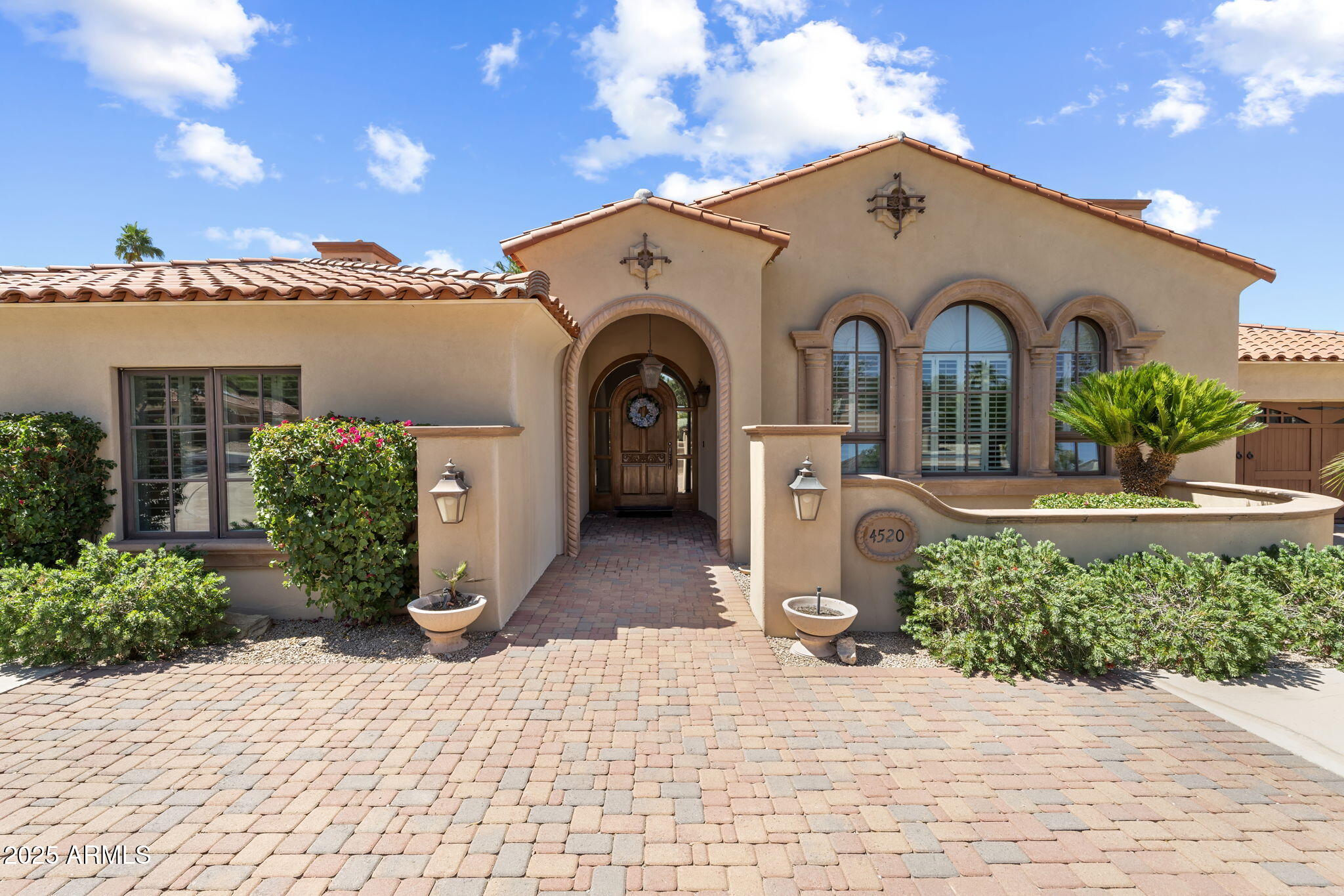 4520 East Horseshoe Road Phoenix, AZ 85028 - Photo 11 of 50 a front view of a house with a yard