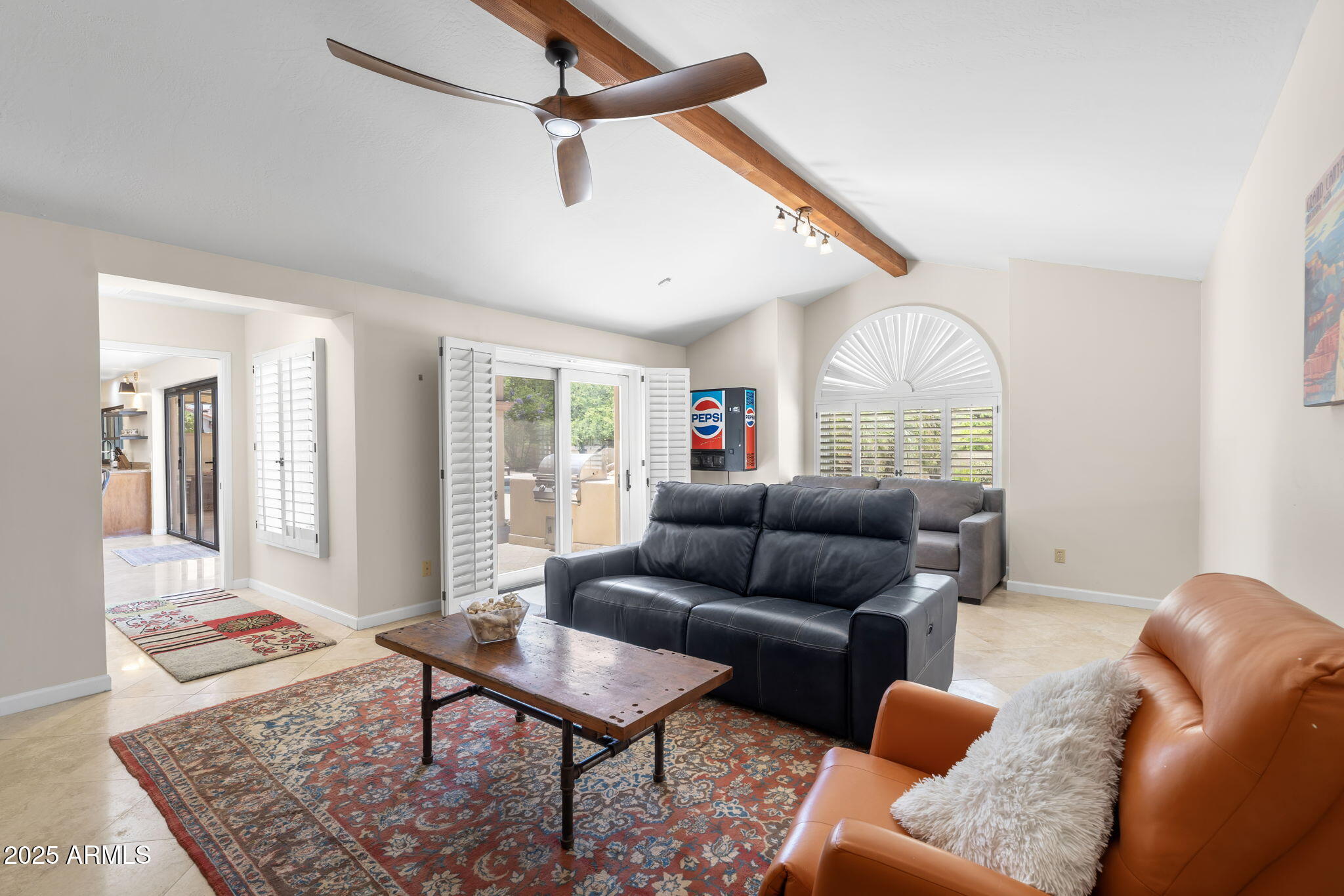 4520 East Horseshoe Road Phoenix, AZ 85028 - Photo 3 of 50 a living room with furniture and a rug