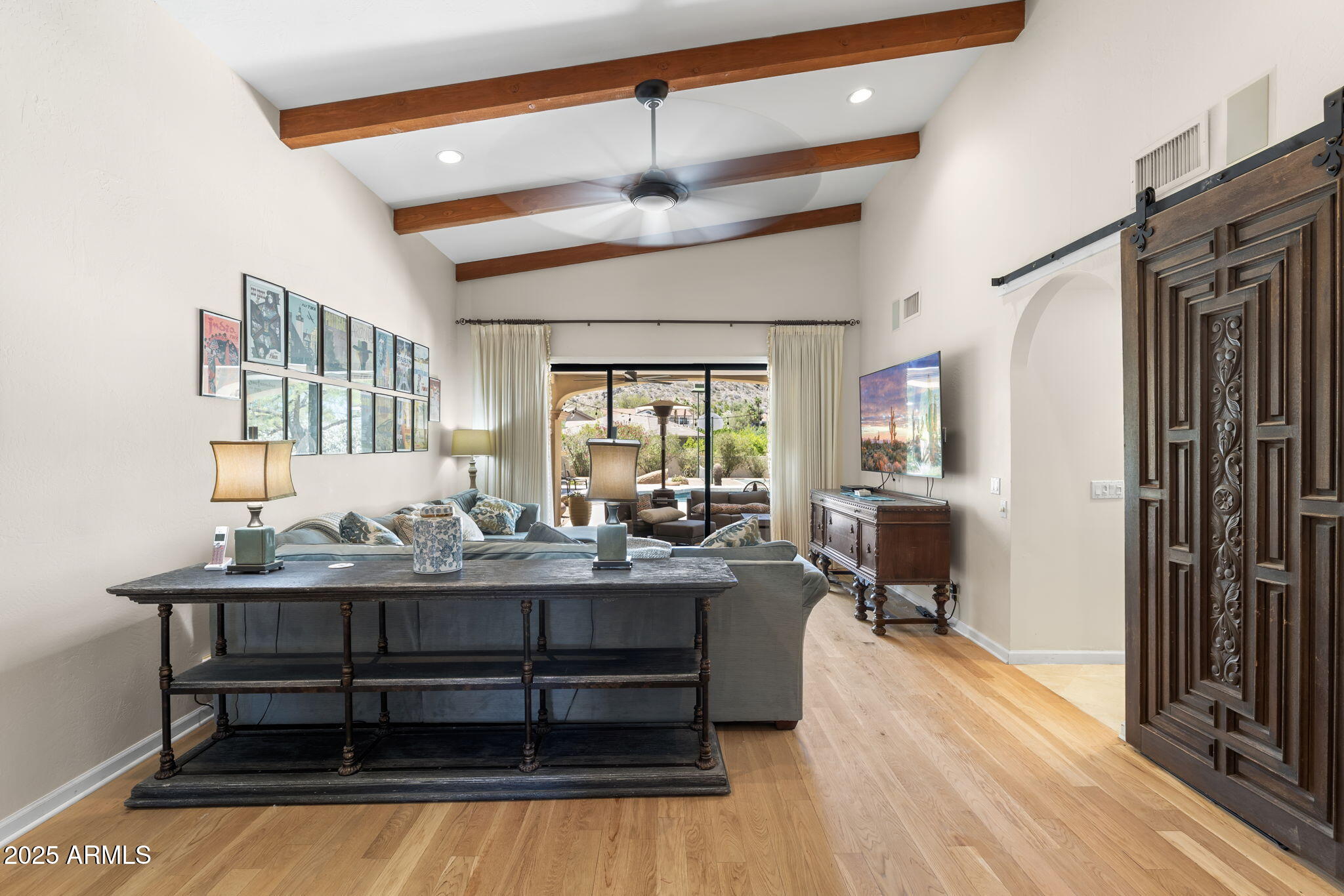 4520 East Horseshoe Road Phoenix, AZ 85028 - Photo 40 of 50 a view of a workspace with furniture window and wooden floor