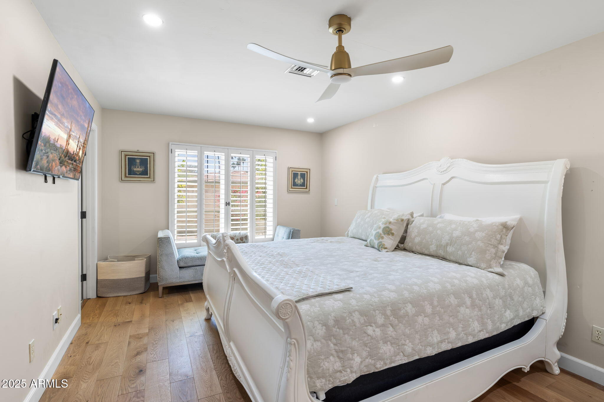 4520 East Horseshoe Road Phoenix, AZ 85028 - Photo 6 of 50 a bed room with a bed a couch and a window