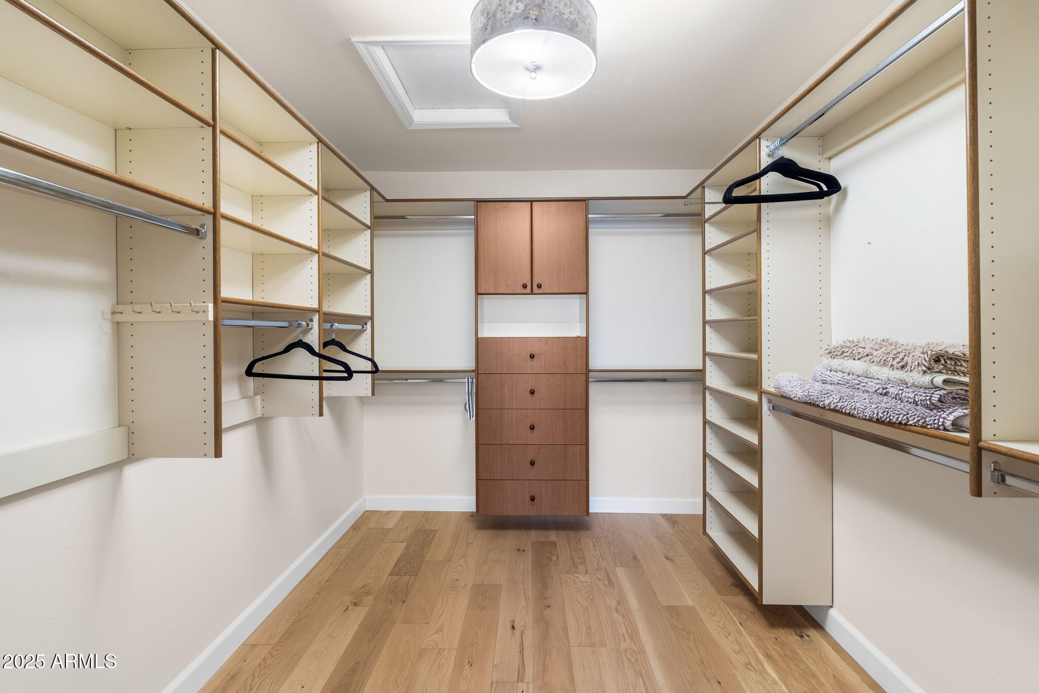 4520 East Horseshoe Road Phoenix, AZ 85028 - Photo 9 of 50 a view of walk in closet with empty racks