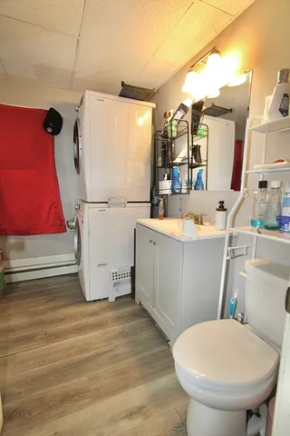 a bathroom with a sink toilet and a shower