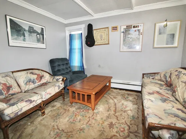 a room with furniture and air hockey table