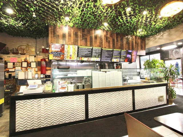 a kitchen view with outdoor seating and kitchen view