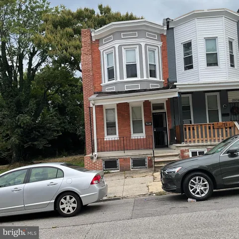 a car parked in front of a house