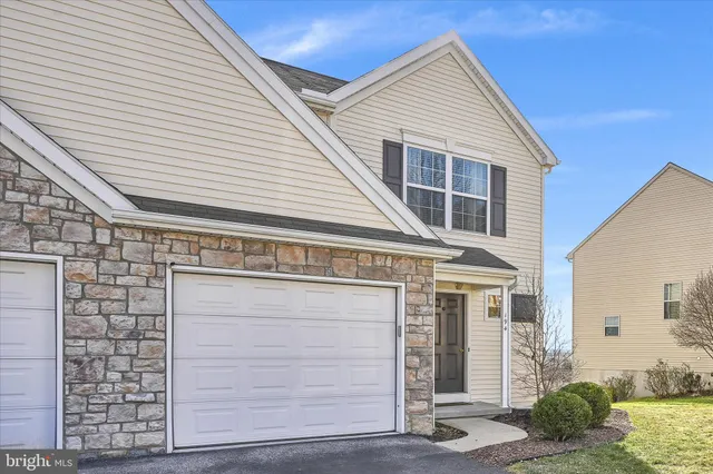 a view of a house with garage