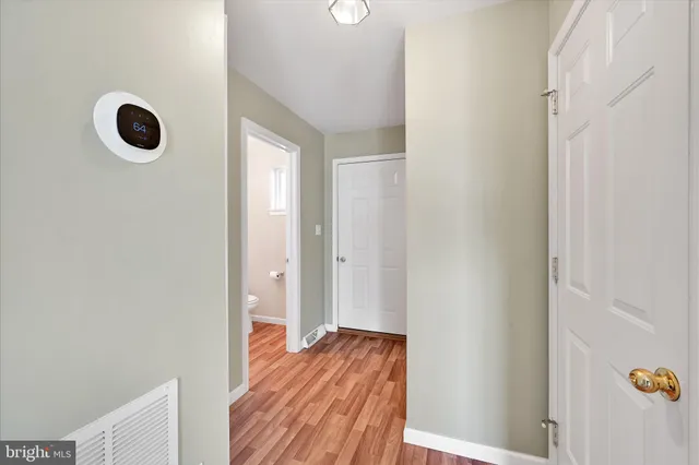 a view of a livingroom with wooden floor